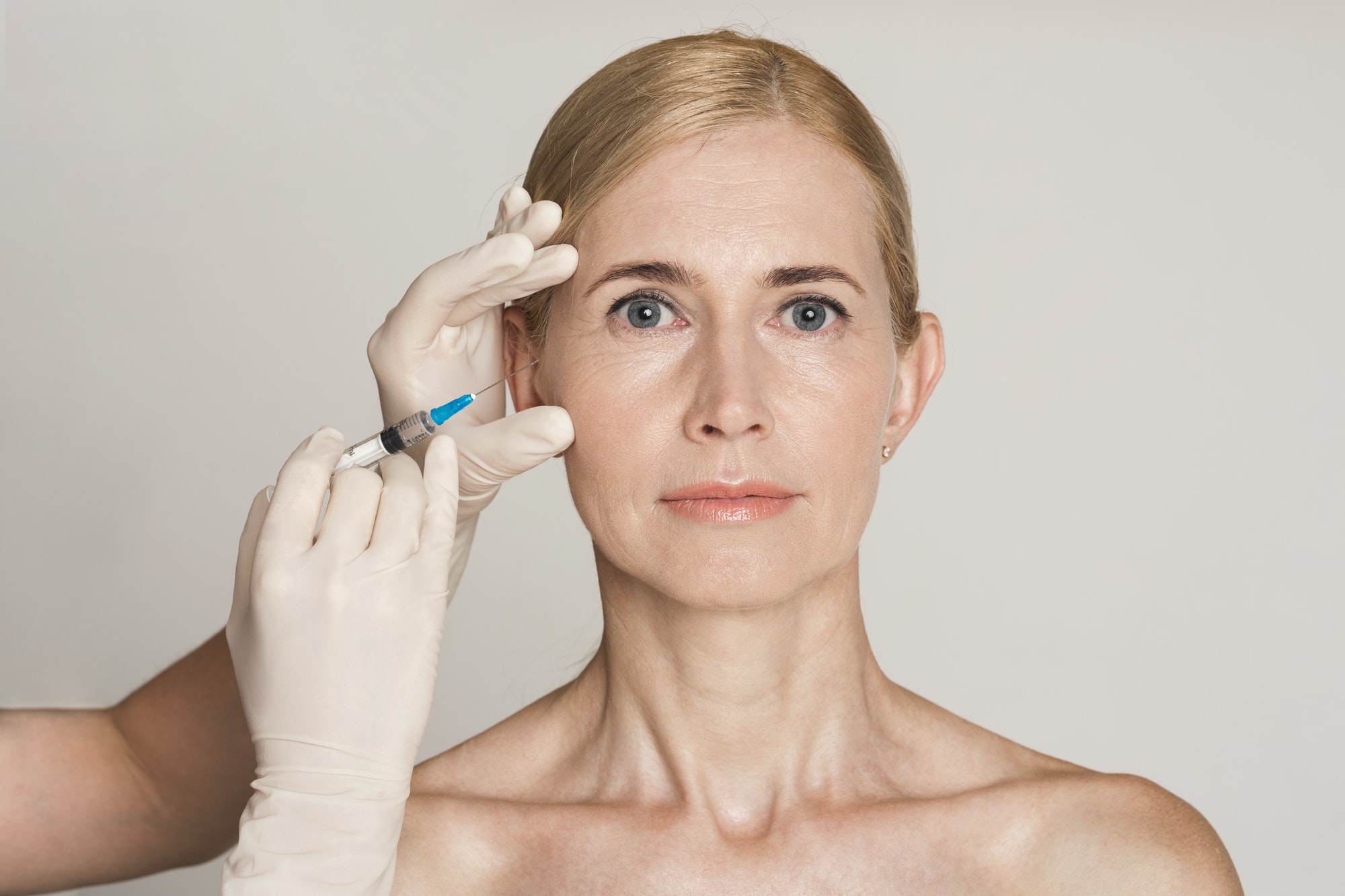 plastic-surgery-middle-aged-woman-receiving-botox-injection.jpg